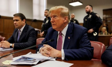 Donald Trump sits at the defendant's table at Manhattan Criminal Court in New York on Friday.