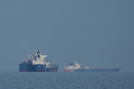 Tankers and cargo ships line up in the strait of Hormuz in March.
