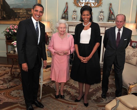 Michelle Obama wearing a black cardigan to meet the Queen and Prince Philip with Barack in 2009