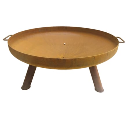 A steel fire bowl on three legs