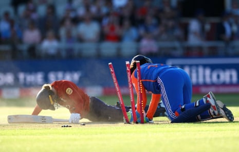 England's Charlie Dean is tally retired by India's Richa Ghosh disconnected nan bowling of Radha Yadav.