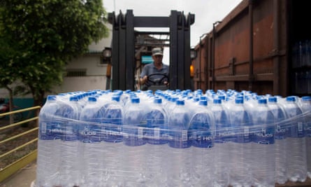 Bottled water shipped in for Rio Doce villagers