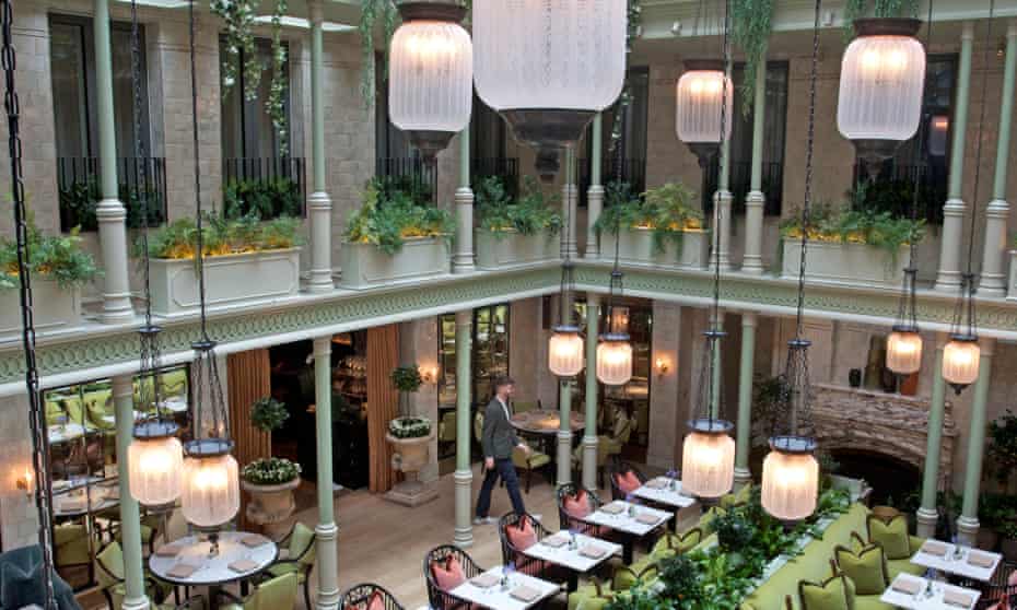‘The vast three-storey atrium that houses the restaurant has about it a touch of the New Orleans French Quarter’: NoMad London.
