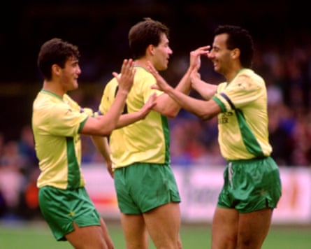 Norwich’s Dean Coney (centre) celebrates his fortunate goal with Malcolm Allen and Dale Gordon.