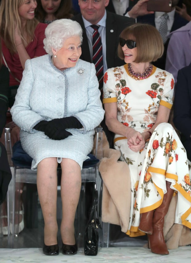 Queen Elizabeth II with Anna Wintour at Richard Quinn’s show in 2018.