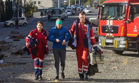 Doctors help a victim of the bombing near Kyiv's central station