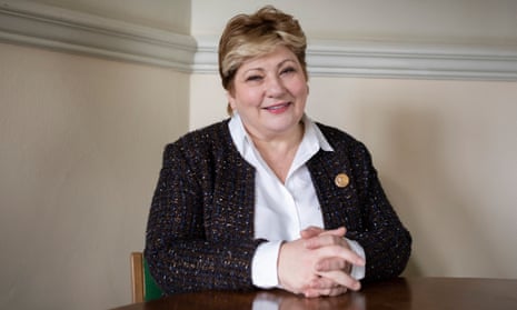Emily Thornberry sits in a chair with her hands clasped on a tabletop