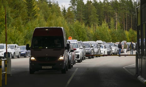 Cars from Russia queue at the border into Finland.