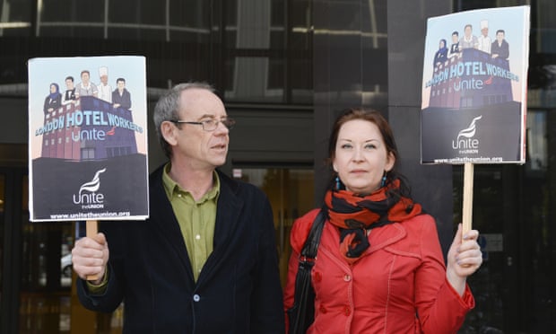 Former hospitality worker Barbara Pokryszka protests outside the London Hilton Metropole in April. She has turned her experiences into a graphic novel. 