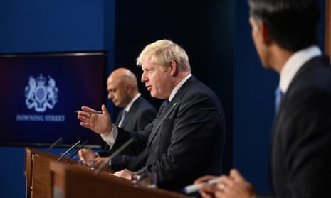 Sajid Javid, Boris Johnson and Rishi Sunak at at a news conference on 7 September where they outlined plans to put a cap on social care costs.