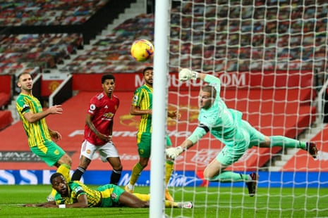 Johnstone denies Marcus Rashford during their recent game at Old Trafford.