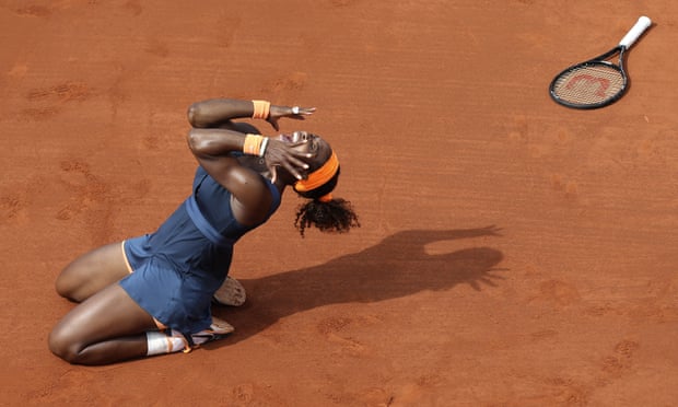 Serena Williams celebrates defeating Maria Sharapova at the 2013 French Open final.
