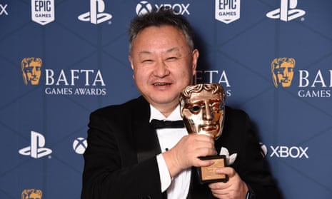 Endearingly surprised at his own success … Shuhei Yoshida at the Bafta games awards, March 2023.