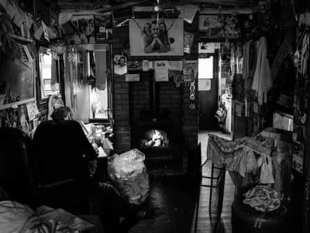 Danny writing in his home.