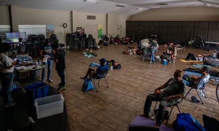 People seeking shelter from the heat rest at the First Congregational United Church of Christ cooling center on 14 July 2023 in Phoenix, Arizona.