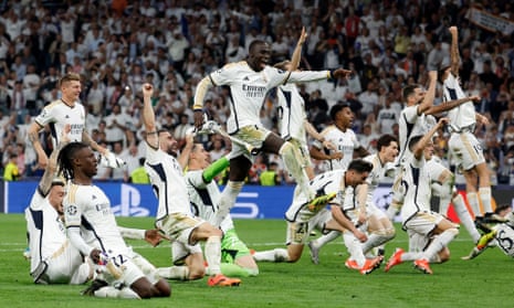 Real Madrid’s Ferland Mendy (centre) and teammates celebrate after the match.