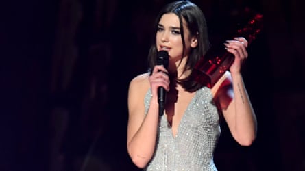 Dua Lipa accepts the award for British solo female artist – the only woman to win in a category where she was pitted against all-male nominees.
