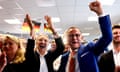Alternative for Germany (AfD) right-wing political party co-chairman Tino Chrupalla (R) and Alternative for Germany (AfD) right-wing political party deputy chairwoman Alice Weidel (L) celebrate.