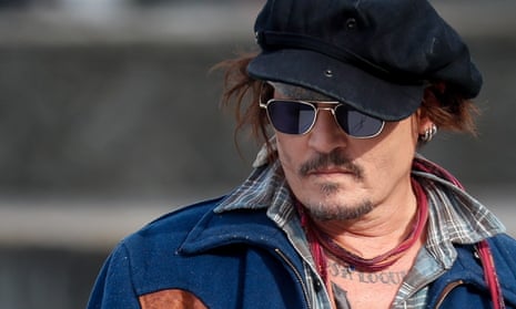 US actor Johnny Depp poses at the 69th San Sebastian International Film Festival, where he decried cancel culture while accepting a lifetime achievement award. 