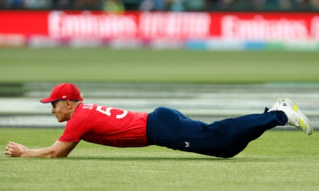 Sam Curran of England takes a catch to dismiss Rohit Sharma of India off the bowling of Chris Jordan.