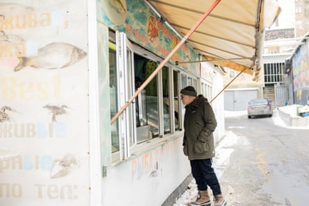 Novelist James Meek at the empty market in Kyiv where he used to shop