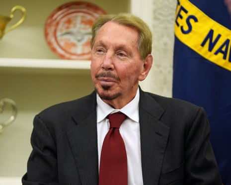 close-up of man wearing black suit and red tie