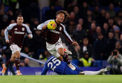 Aston Villa’s Boubacar Kamara is felled by Chelsea’s Moisés Caicedo