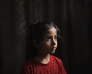 Elien al-Madhoun, six, at her grandfather’s house, where she is living after her house was destroyed during an 11-day war, in Beit Lahia, northern Gaza Strip. Elien was not yet born when her father lost his home in the 2014 Gaza War. In May, she screamed out at the sounds of airstrikes and shelling in Bait Lahia in northern Gaza, says her father, Ahmed Rabah al-Madhoun. ‘When nine homes are completely destroyed next to one another and my daughter sees this, she can’t understand what happened,’ he says