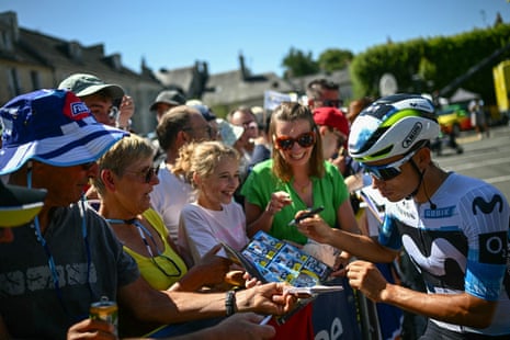 Movistar’s Einer Rubio signs autographs earlier nan commencement of nan Tour de France’s sixth shape betwixt Bayeux and Vire Normandie.