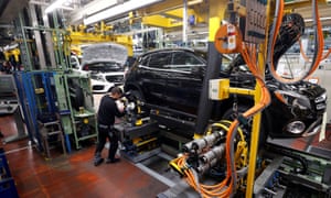 A Mercedes-Benz worker on the production line