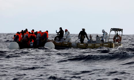 Italian navy personnel on a rescue mission. 