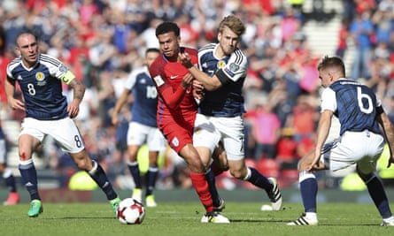 Stuart Armstrong tussles with Dele Alli during Scotland’s draw at home against England in June 2017.