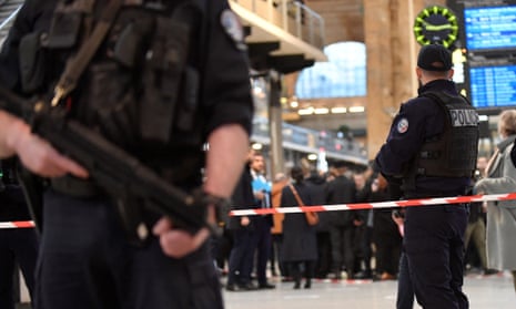 French police stand guard at the Gare du Nord train station on Wednesday, after the incident.