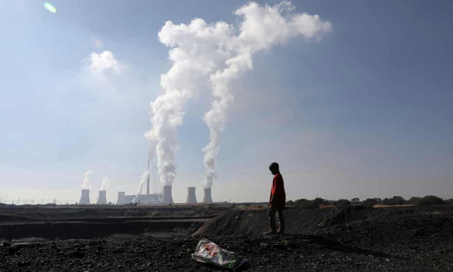 Smoke rises from the Duvha coal-based power station in Mpumalanga province, South Africa.