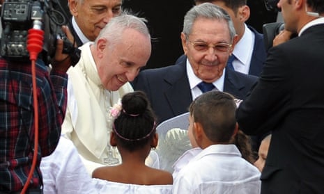 Pope Francis is welcomed by Cuban president Raúl Castro and Cuban children upon landing at Havana’s international airport.