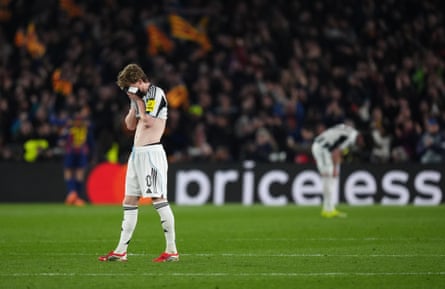 Newcastle United’s Anthony Gordon is dejected after Barcelona score their seventh goal at Camp Nou