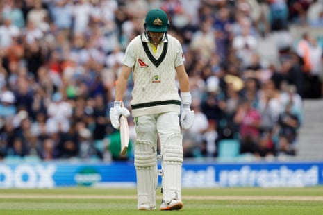 Australia’s Marnus Labuschagne leaves the field after losing his wicket to England’s Mark Wood.