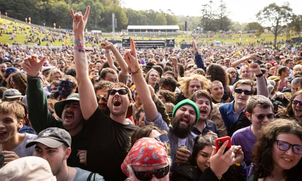 Festivalgoers get into the music on Saturday.