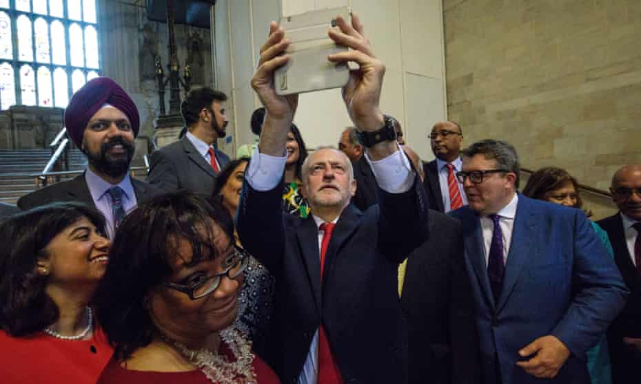 Jeremy Corbyn takes a selfie with Labour MPs in Westminster Hall.