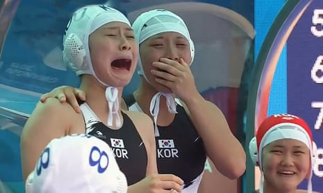 Players from the South Korean water polo squad emotionally celebrate their first goal of the 2019 FINA World Championships.