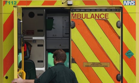 Paramedic opens ambulance door