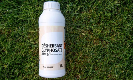 Bottle of glyphosate on grass
