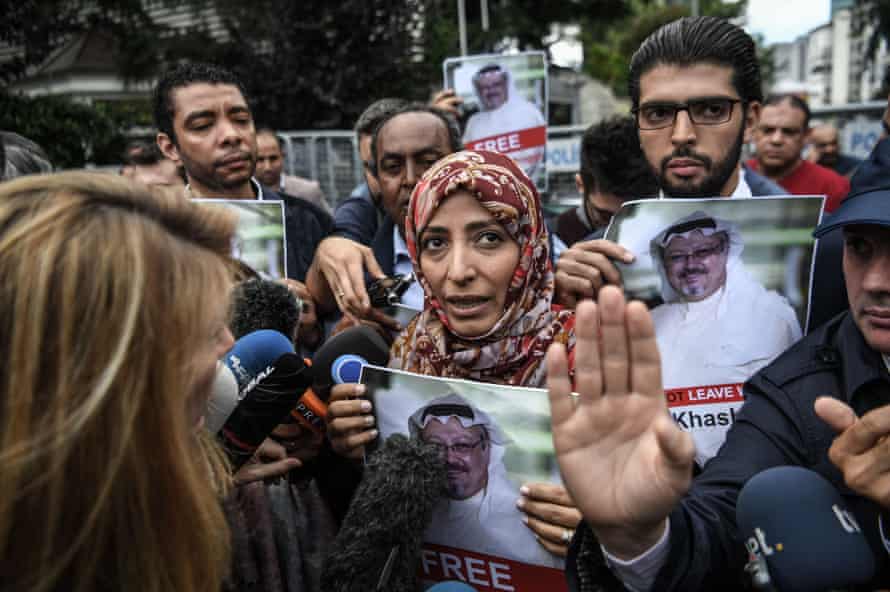 Tawakkol Karman holds a poster of journalist Jamal Khashoggi as she speaks to the press in front of the Saudi consulate in Istanbul.