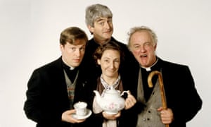 Kelly as Father Jack (right), with Father Ted co-stars Dermot Morgan, Ardal O’Hanlon and Pauline McLynn.