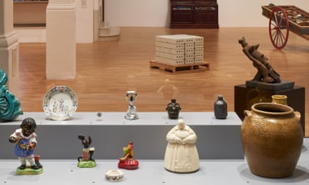 David Drake’s storage jar (1862), far right, alongside racist ceramics from the Ed J Williams collection and Gates’s own art at Whitechapel Gallery.