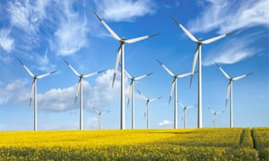 Wind turbines in a field of rapeseed