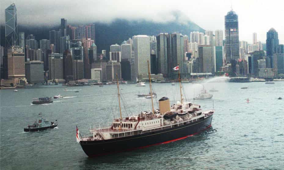 the royal yacht Britannia sails into Hong Kong harbour on 23 June 1997.