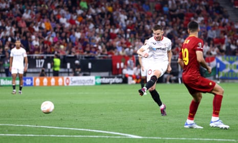 Sevilla's Ivan Rakitic shoots at goal and hits the post against Roma in the 2023 Europa League final.