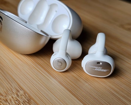 A pair of Baseus Inspire XC1 earbuds