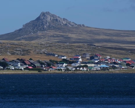 View from the sea of buildings on Stanley with Mount Tumbledown behind.